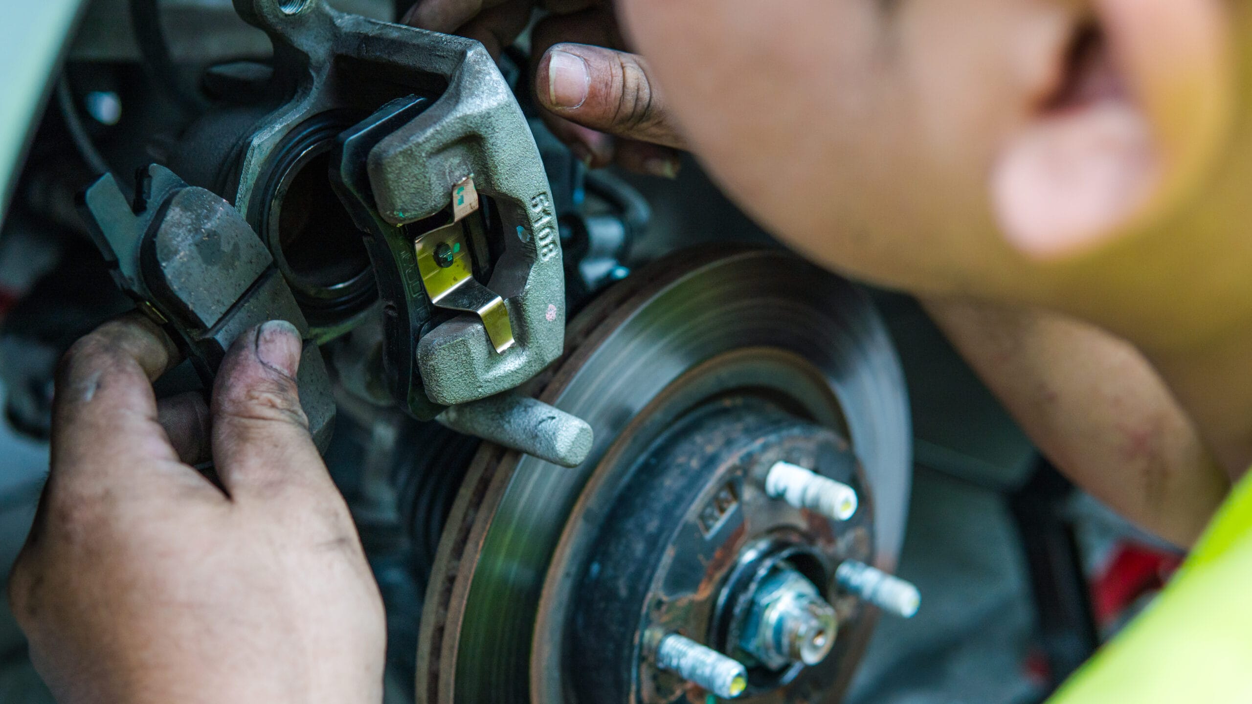 brake squealing and grinding caused by worn brake pads